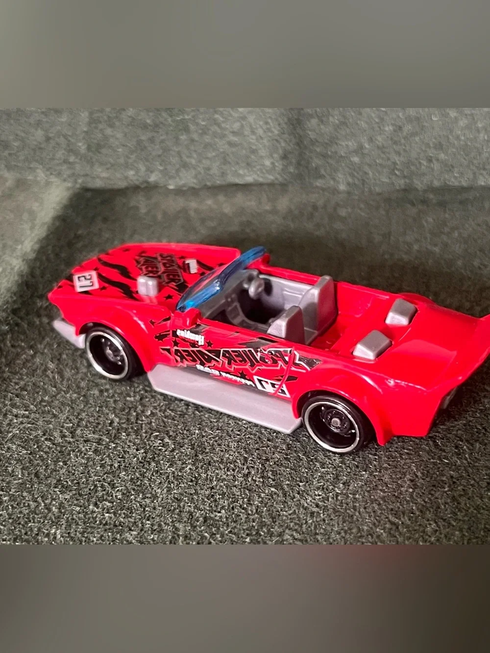 Red Assorted Brands of Die-Cast Racing Cars